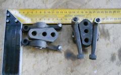 Коромысло в сборе с седлом LG 12159630