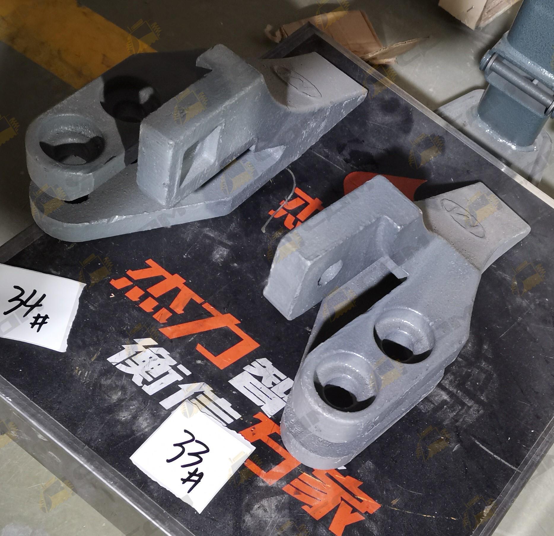 Зуб боковой левый переднего ковша Shanmon 388H Z110010800